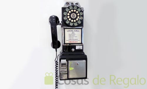 Teléfono retro de pared, un objeto de diseño clásico y funciones actuales