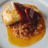 Receta de Lomos de bacalao con chorizo y pimientos