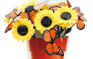Flores con mariposa a energía solar